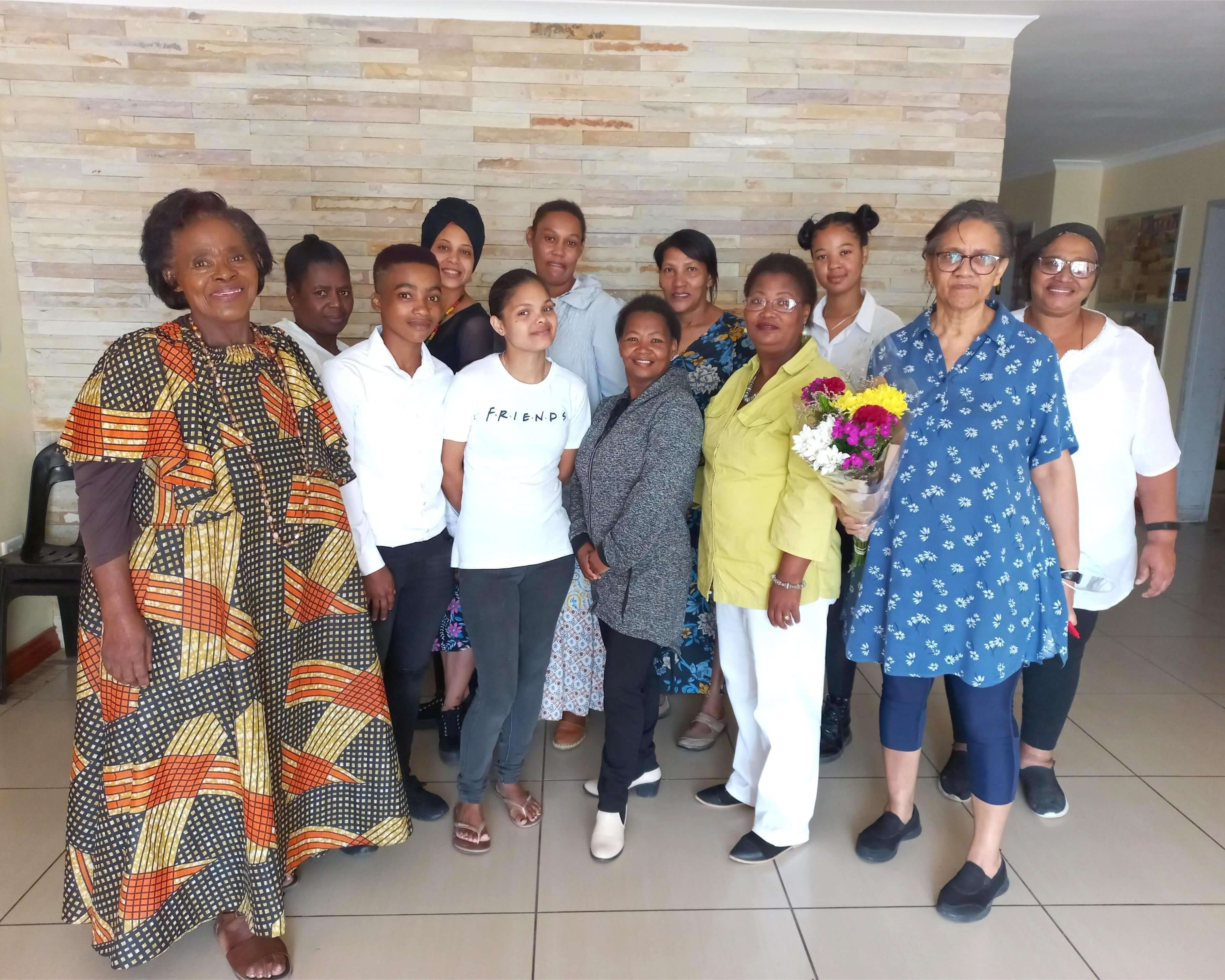 A group of women posing for a photo